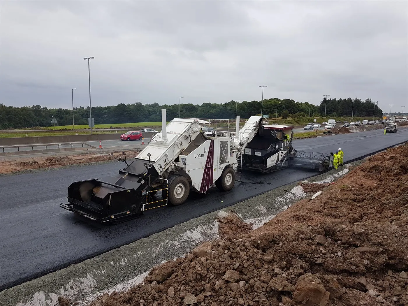 Road surfacing under way on a live highway scheme